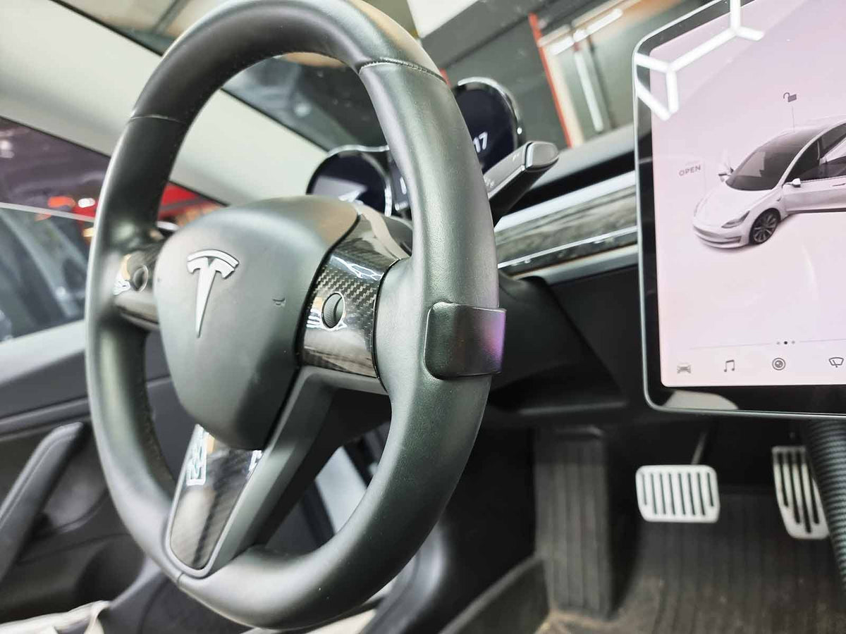 Tesla model 3 online steering wheel weight